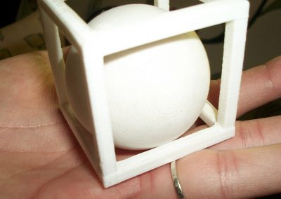 A 3D printed ball and cube by Rich.
