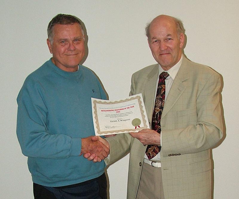 Joe Martin and Gerald Wingrove Gerald Wingrove (right) accepts his Craftsman of the Year Award from Joe Martin.