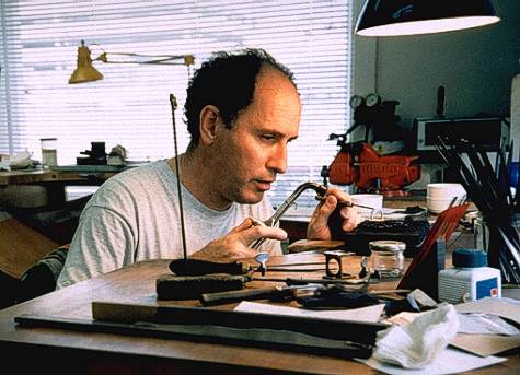 Abrasha at His Workbench Abrasha works carefully in his San Francisco shop.