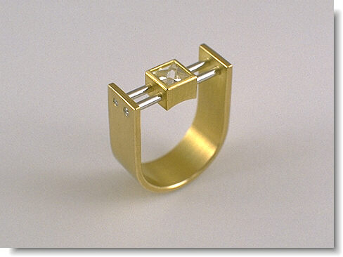 Context Cut Ring A context cut ring made of gold and platinum.