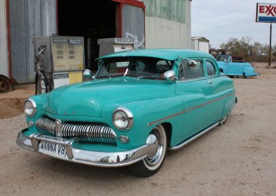 1949 Mercury "Rebel Rouser" in front of shop.
