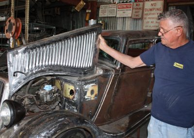 Ernie lifting the louvered hood.