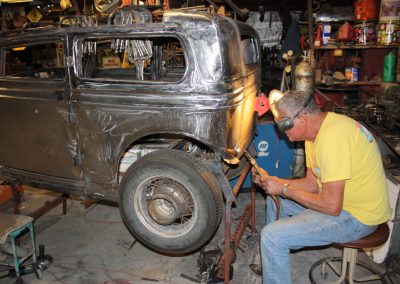 Ernie modifying the rear fender of his "Bonnie."