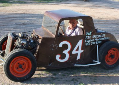 Ernie seated in Dwarf racer