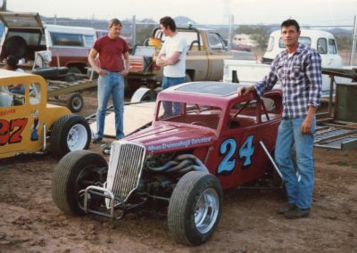 Ernie posing with 24 car.