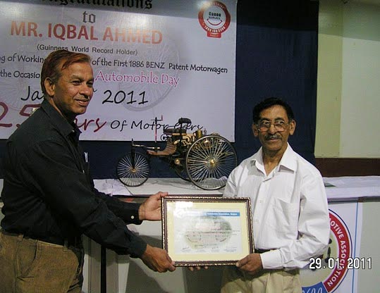 Iqbal Receiving an Award Iqbal receiving an award from the Central India Vintage Automotive Association.