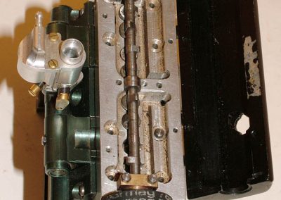 Engine block front view with cam belt.