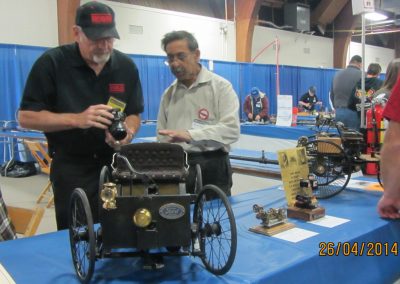 Iqbal explaining the features of the Quadricycle.