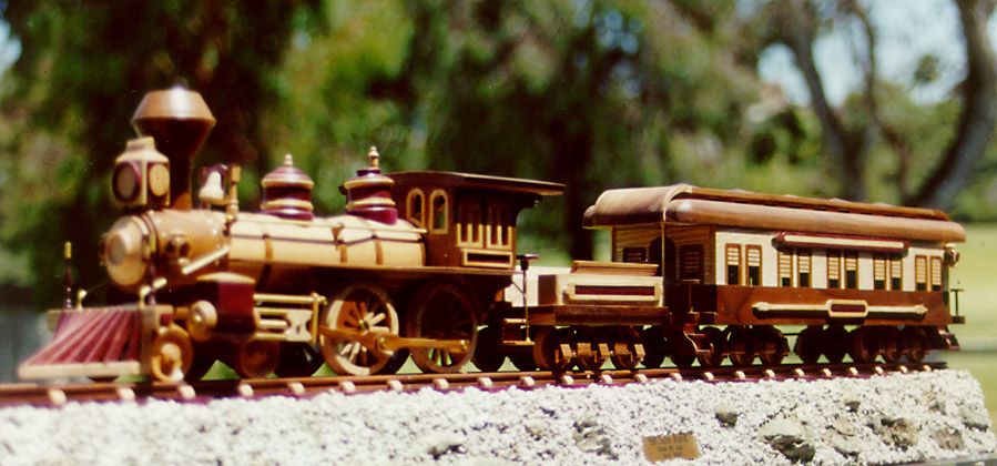 4-4-0 Steam Locomotive Jim's old fashioned 4-4-0 steam locomotive, tender and passenger car.
