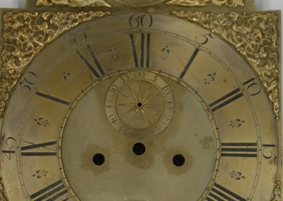 Third antique dial with corrosion.