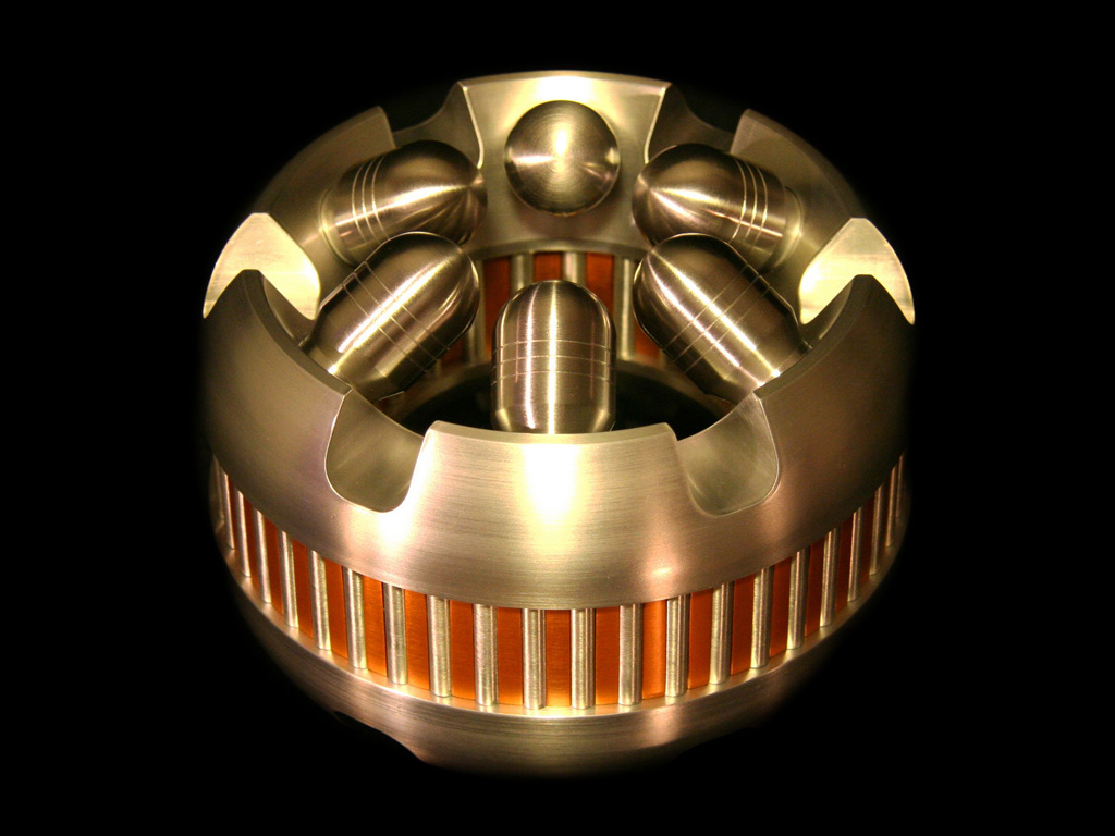 RN 753362224531143 A circular, open-face metal sculpture.