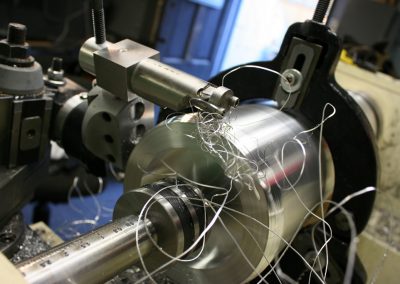 Lathe turning process.