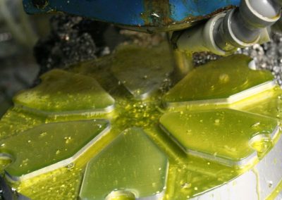 Milling work close-up with coolant.