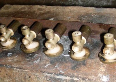 Starting to fabricate drain cock bodies.