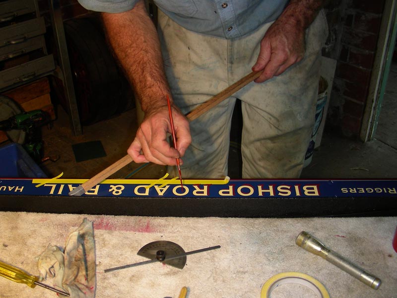 Ross Drawing Lines Ross trying his hand at signwriting.