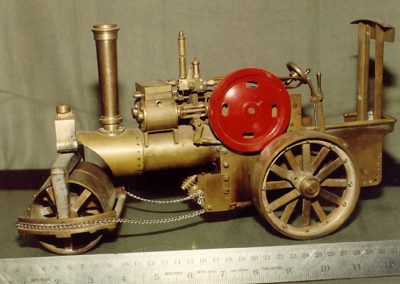 Steam powered road roller model.