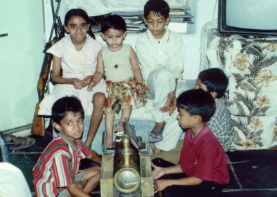 Some local children with the 0-6-0 tank locomotive.