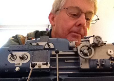 Alfred Mellows’ son, Malcolm looks over the details of his father’s miniature masterpiece.