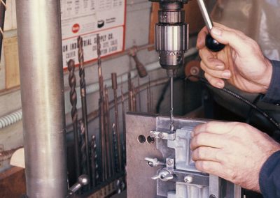Jerry drilling the hinge pin holes.