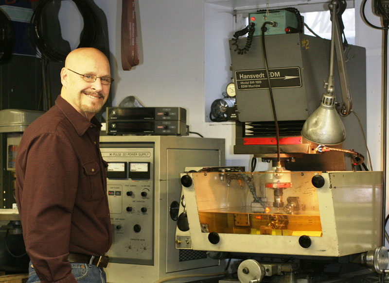 Conley51 Gary in front of his EDM machine.