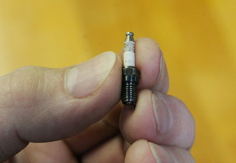 Conley57 The miniature spark plug used for the Stinger engine.