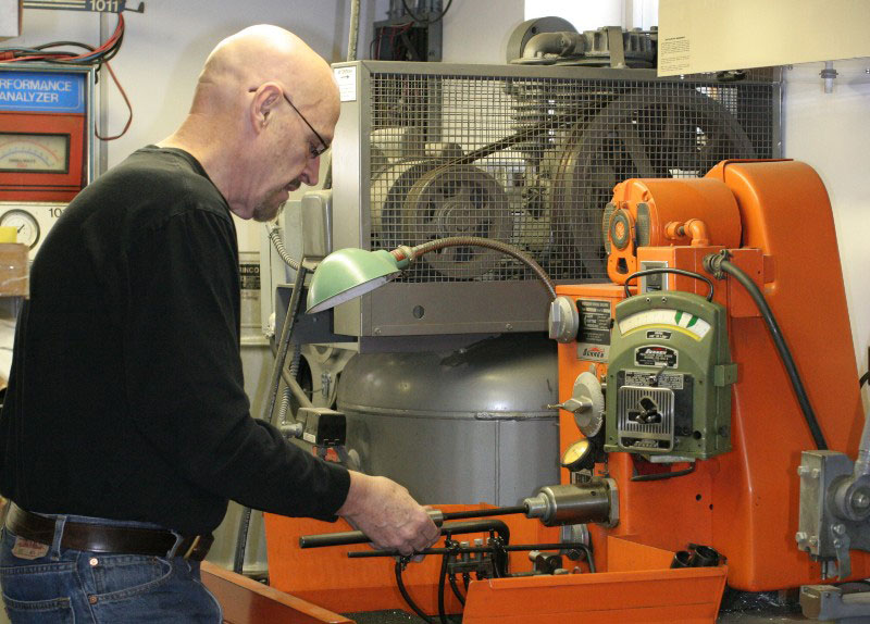 Conley62 Gary using the Sunnen Honing Machine.