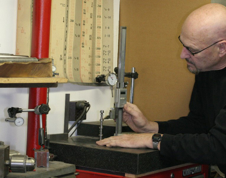 Conley63 Gary using the Granite Surface Plate with height gauge.