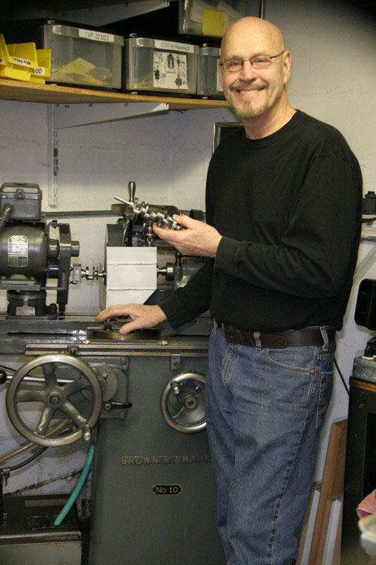 Conley65 Gary in front of the Brown & Sharp tool cutter and grinder.