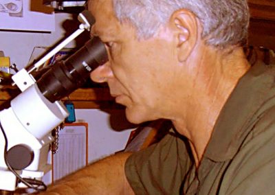 Damien using his microscope.
