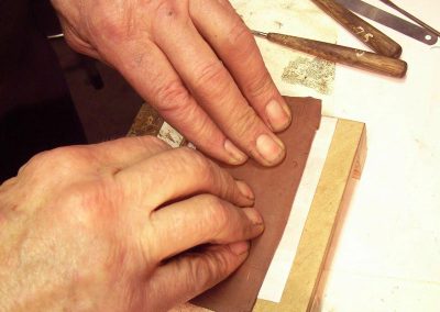 Preparing the clay.