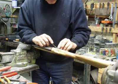 Damien working in his shop.