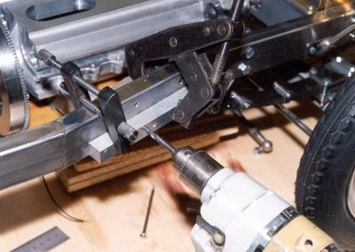 Drilling holes for engine mounting bracket.