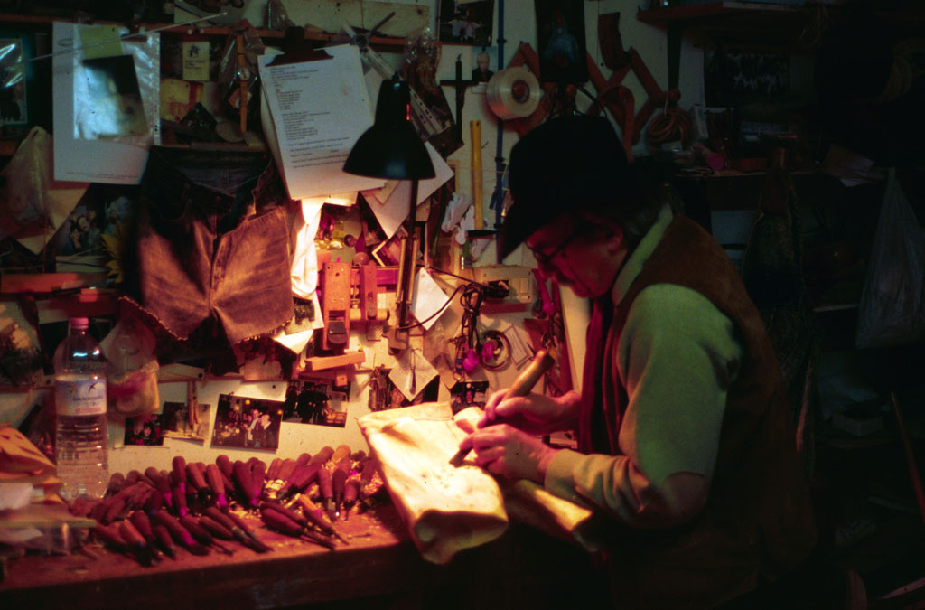 Mr. De Marchi at Work Mr. De Marchi at the workbench.