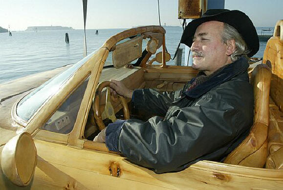 Mr. De Marchi in His Wooden Ferrari Mr. De Marchi in his floating wooden Ferrari F50.