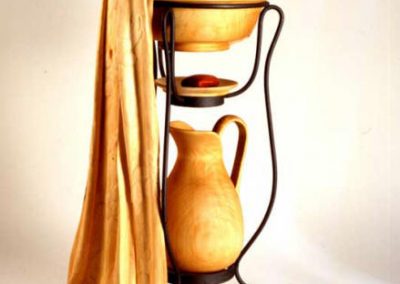 A wooden wash basin sculpture.