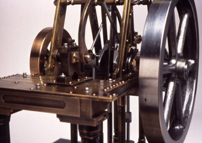 A close-up view of the flywheels and crankshaft on Jenny.