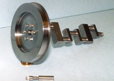 Flywheel attached to the crankshaft.
