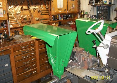 The freshly painted rear fenders.