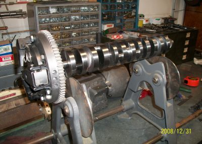 Balancing the crankshaft, flywheel, and clutch assembly.