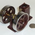 Another view of the hit-n-miss engine with coin for reference.