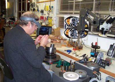 Engraver Rex Pederson at work on a car.