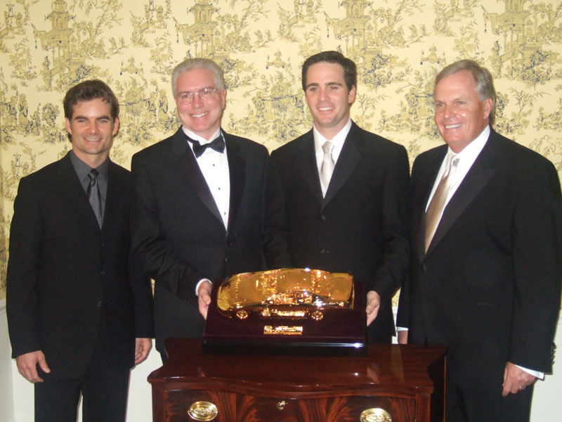 Mike at a Gold Car Presentation for Jimmy Johnson Mike at another gold car presentation with Jimmy Johnson and company.