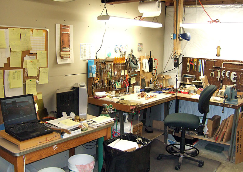 Mike's Shop A look Mike's desk and workbench.