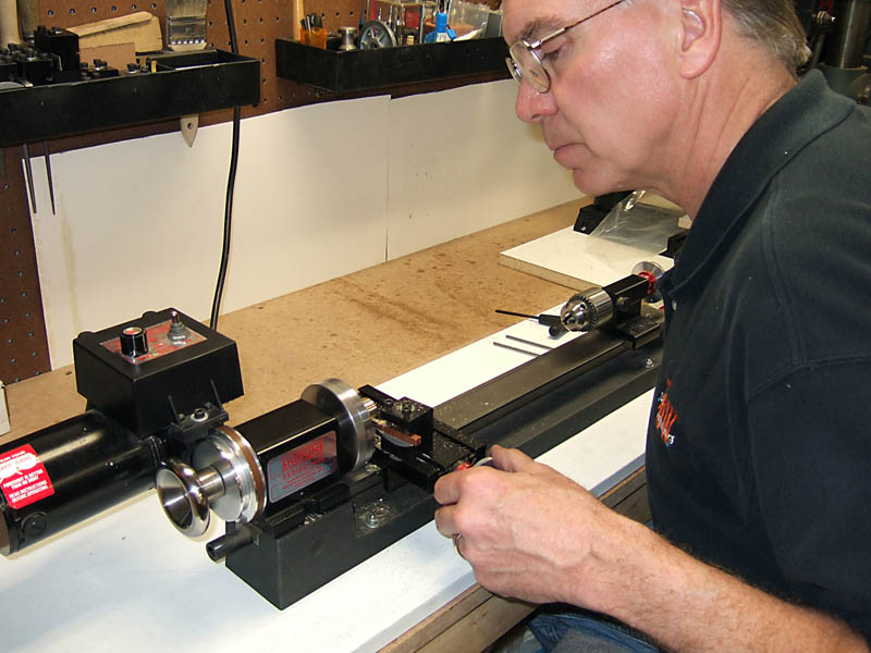 Mike Working on His Lathe Mike at work on the lathe.