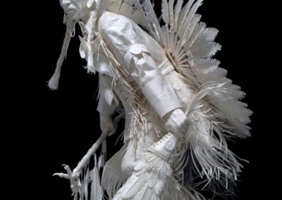 A dancing sculpture called, “Traditional Dancer—Prairie Chicken Dance.”