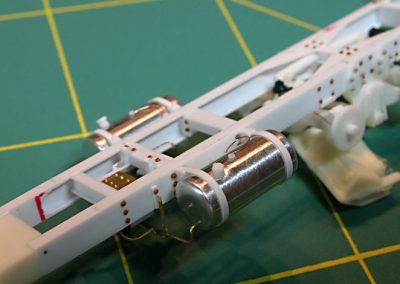The fuel tanks set on the dump truck frame.