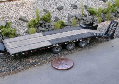 Joe's AC3-25 tag trailer with penny for scale.