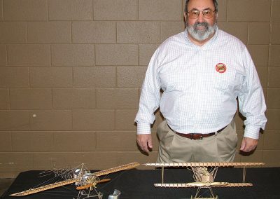 Ken displaying two of his Fokker models at a show.