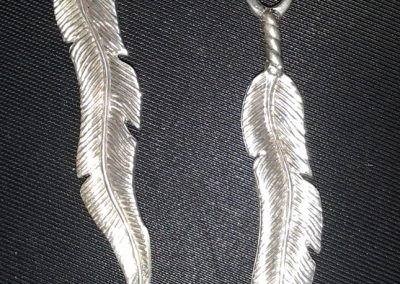 Bryan's silver feather zipper pulls.