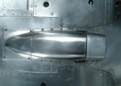 The Spitfire carburetor air scoop.